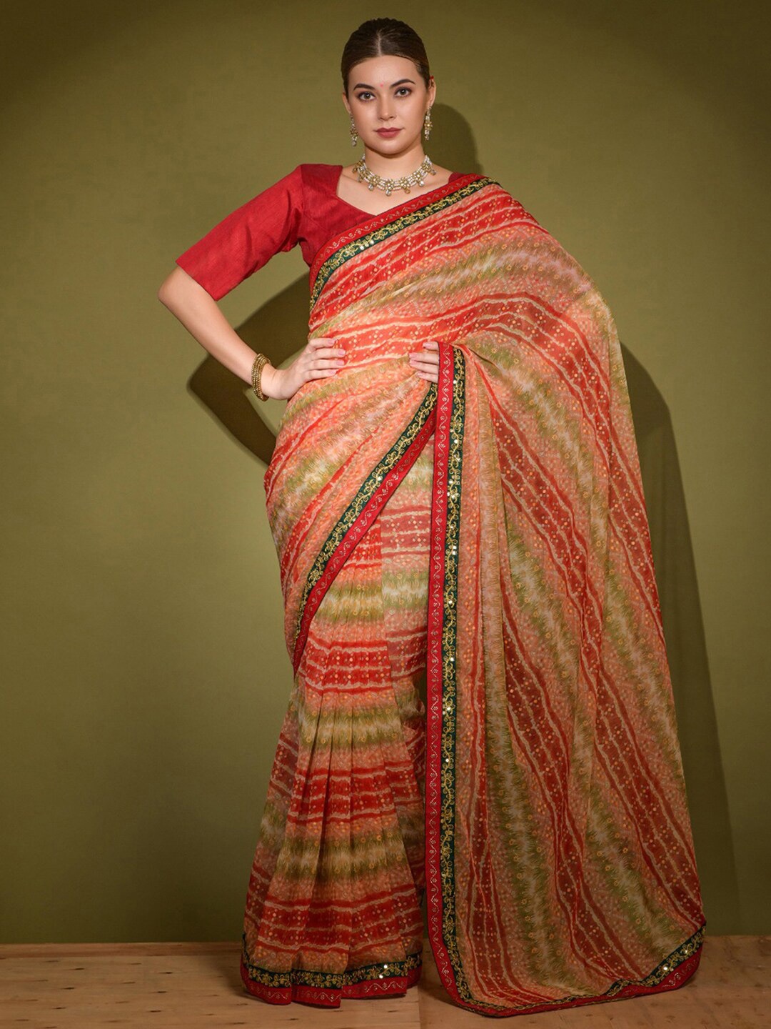 

Mitera Red & Green Bandhani Sequinned Saree