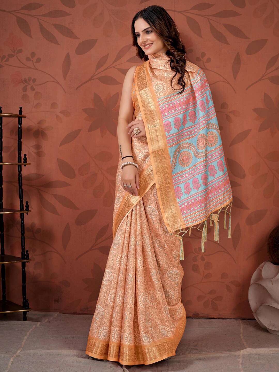 

Mitera Peach-Coloured & Gold-Toned Floral Printed Zari Saree