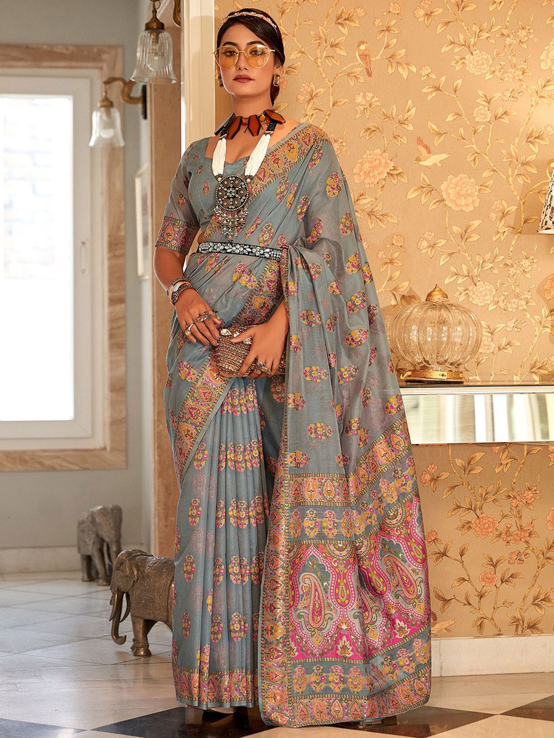 

Mitera Grey & Beige Ethnic Motifs Woven Design Silk Cotton Saree