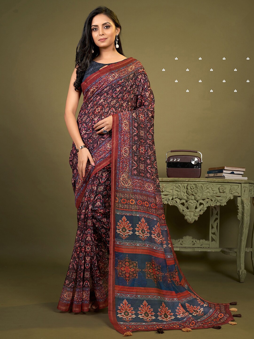 

Mitera Purple & Blue Ethnic Motifs Zari Saree