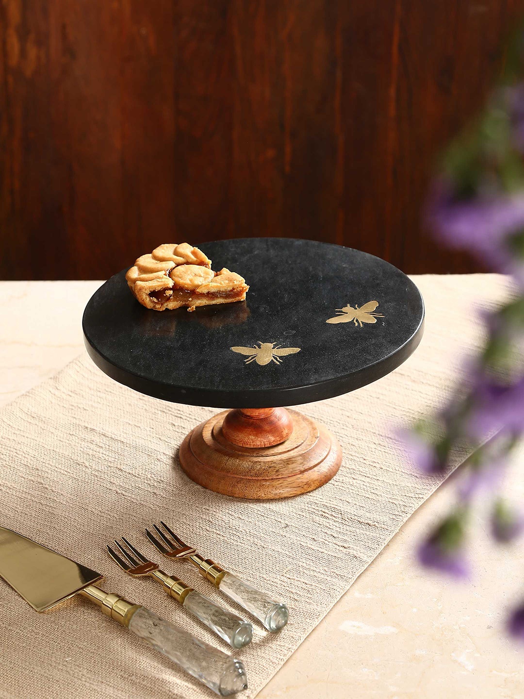 

Amoliconcepts Black Granite With Brass Bee Details Cake Stand