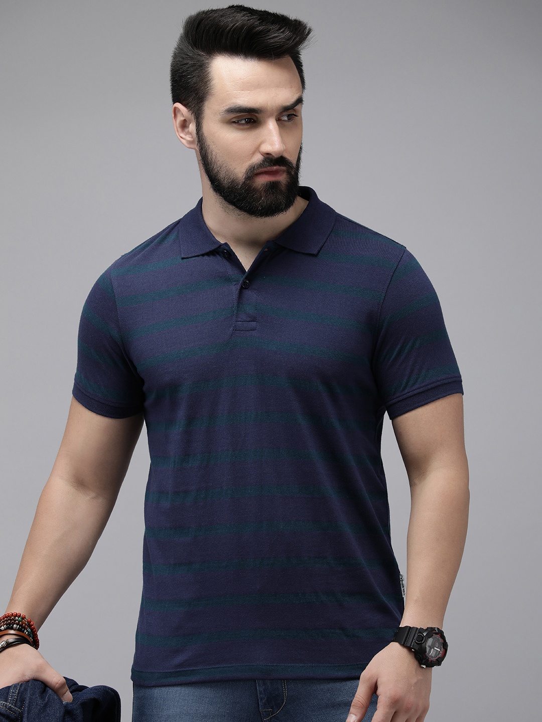 

Roadster Men Striped Polo Collar T-shirt, Blue