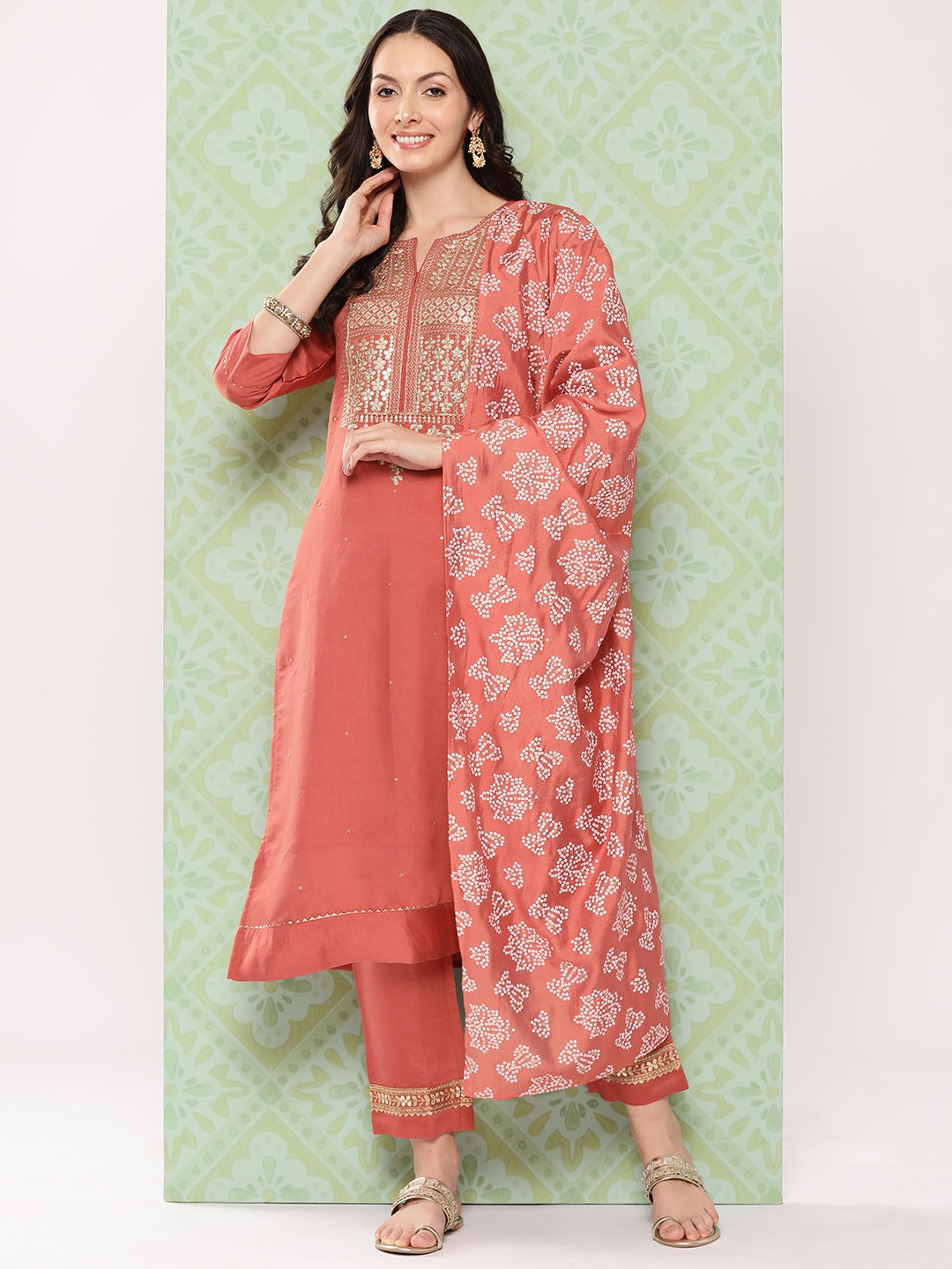 

Varanga Orange Ethnic Motifs Yoke Design Gotta Patti Kurta with Trousers & With Dupatta