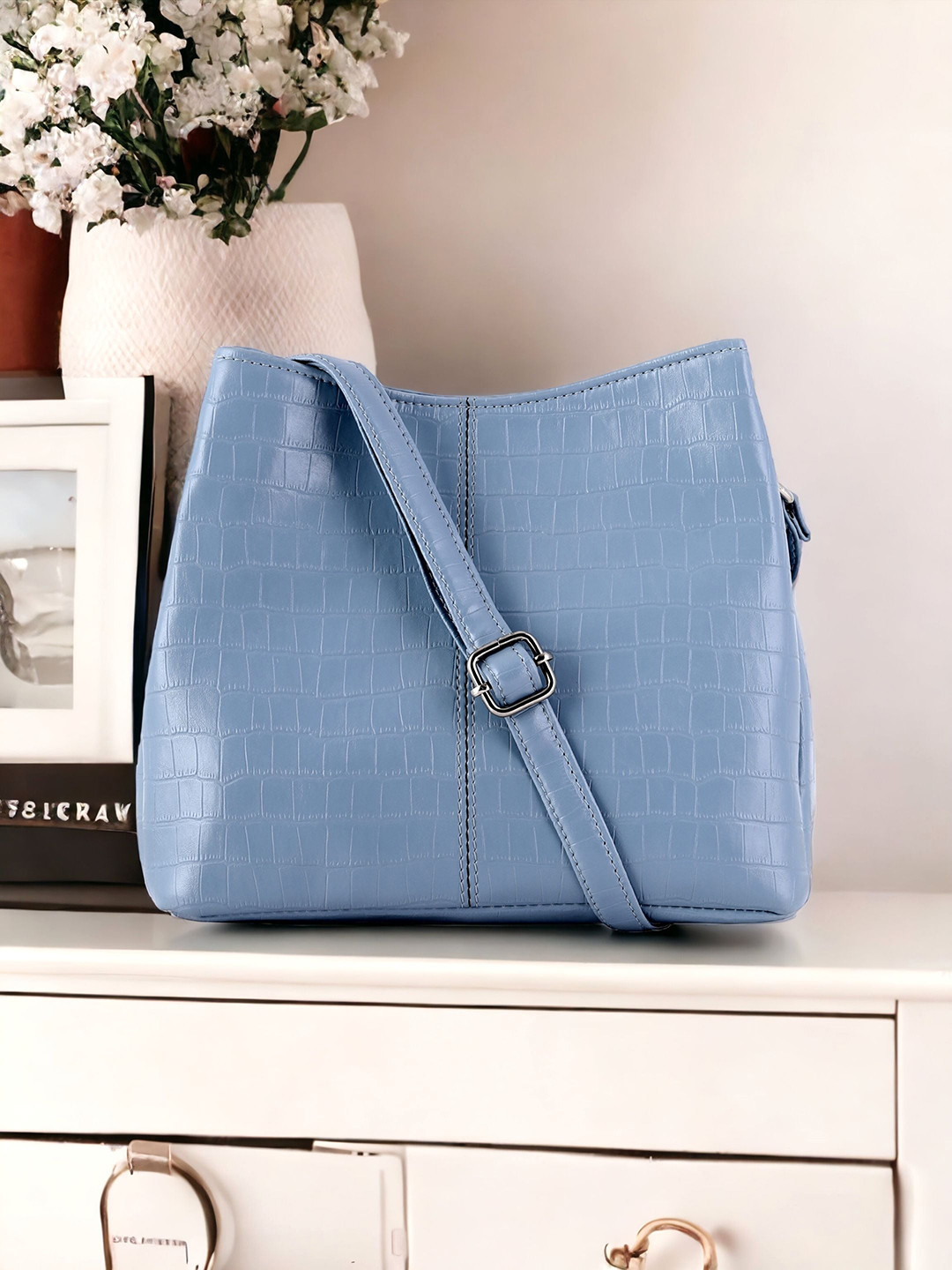 

Toteteca Women Textured Structured Sling Bag, Blue