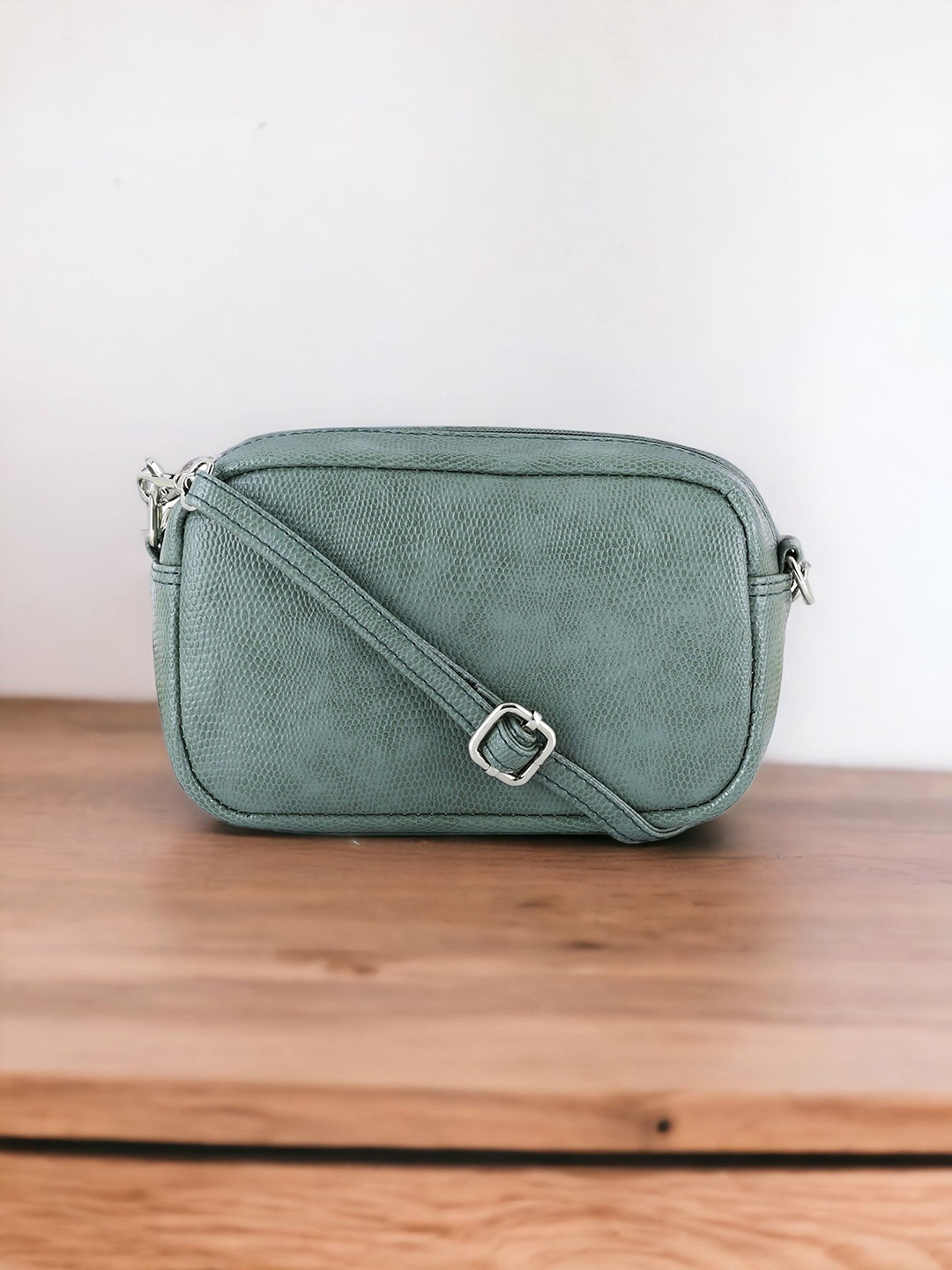 

Toteteca Half Moon Sling Bag, Green