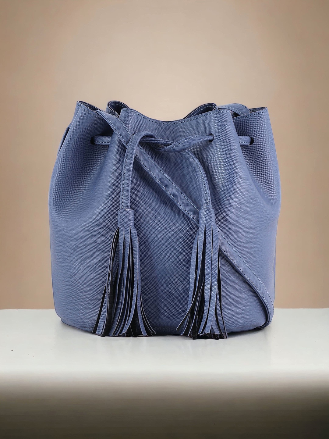 

Toteteca Bucket Sling Bag, Blue