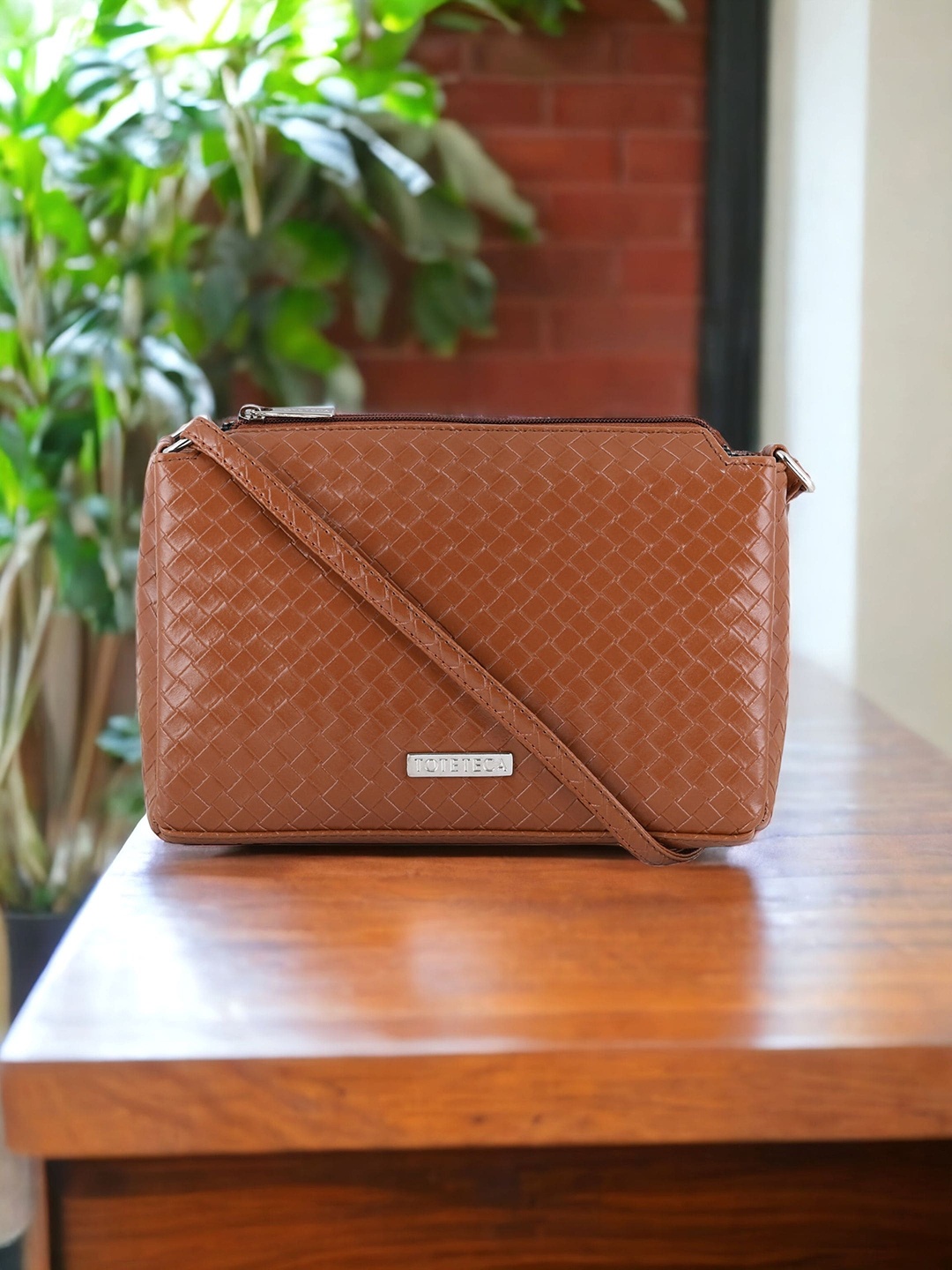 

Toteteca Textured Bucket Sling Bag, Tan