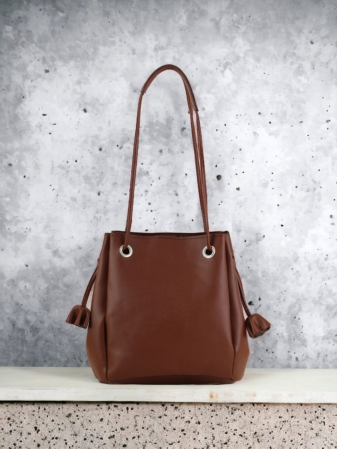 

Toteteca Brown PU Bucket Shoulder Bag