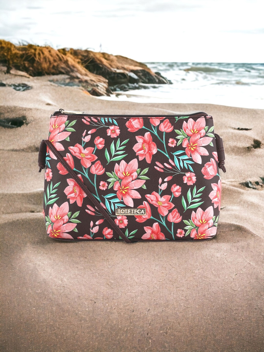 

Toteteca Floral Printed Swagger Sling Bag, Brown