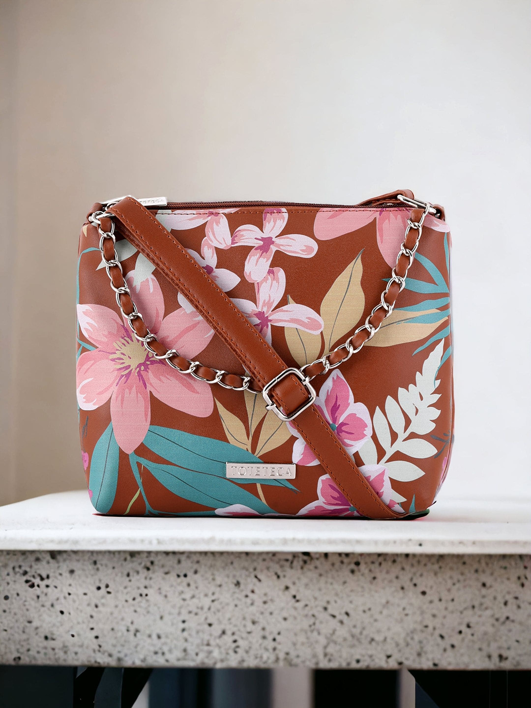 

Toteteca Floral Printed PU Small Structured Sling Bag With Chain Strap, Tan