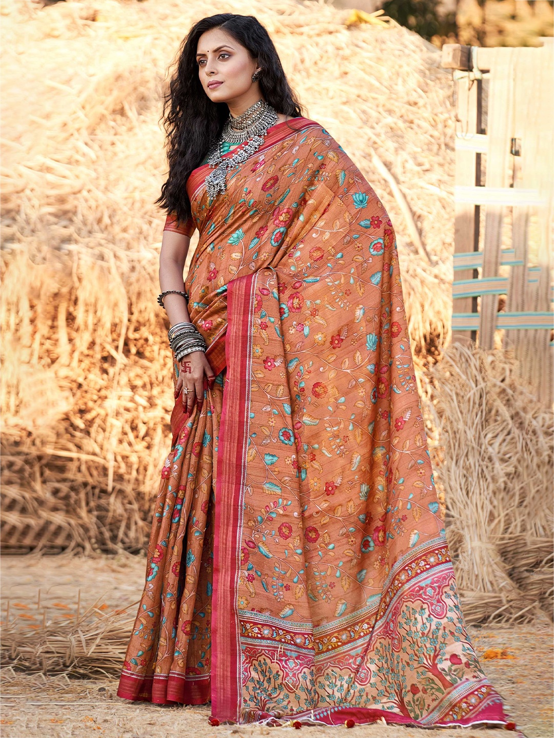 

Mitera Orange & Blue Kalamkari Printed Zari Saree