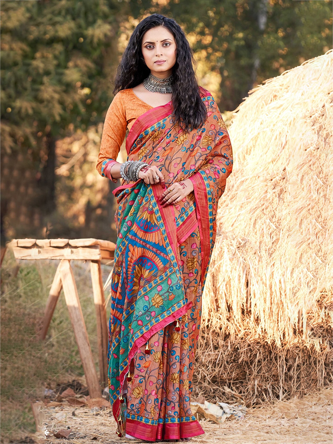 

Mitera Orange & Blue Kalamkari Saree