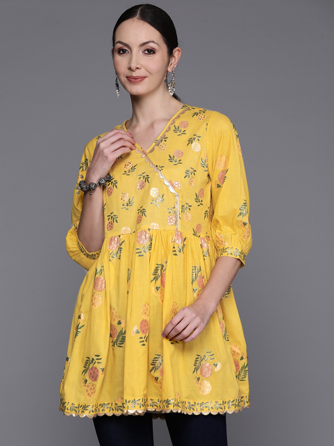 

Ahalyaa Floral Printed Tunic with Lace Detail, Mustard