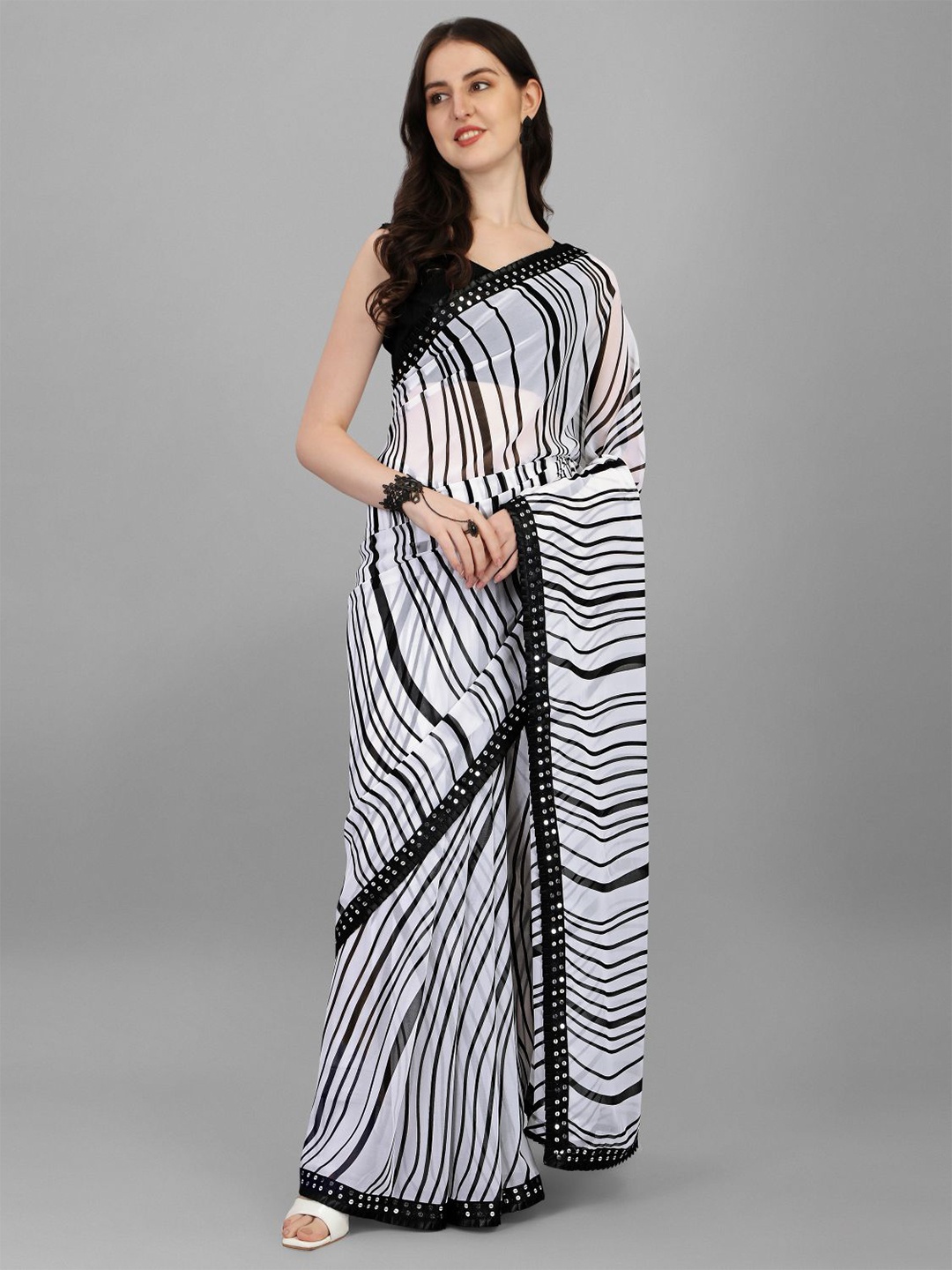 

B4ME.COM Striped Sequinned Pure Georgette Leheriya Saree, Black