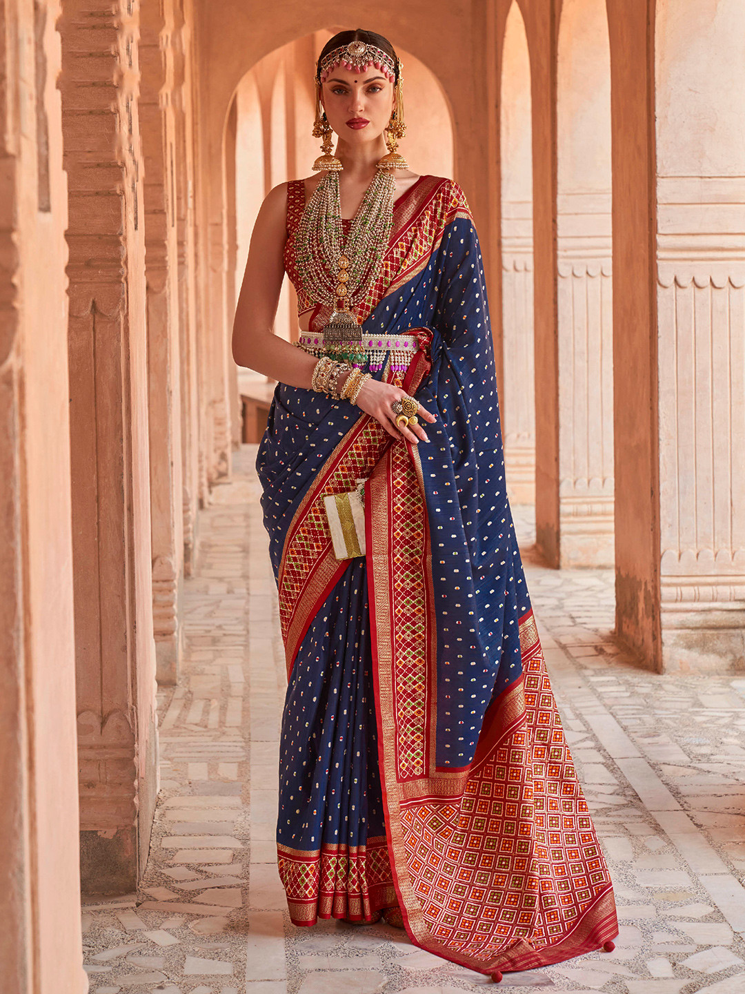 

Mitera Navy Blue & Red Woven Design Zari Silk Blend Patola Saree