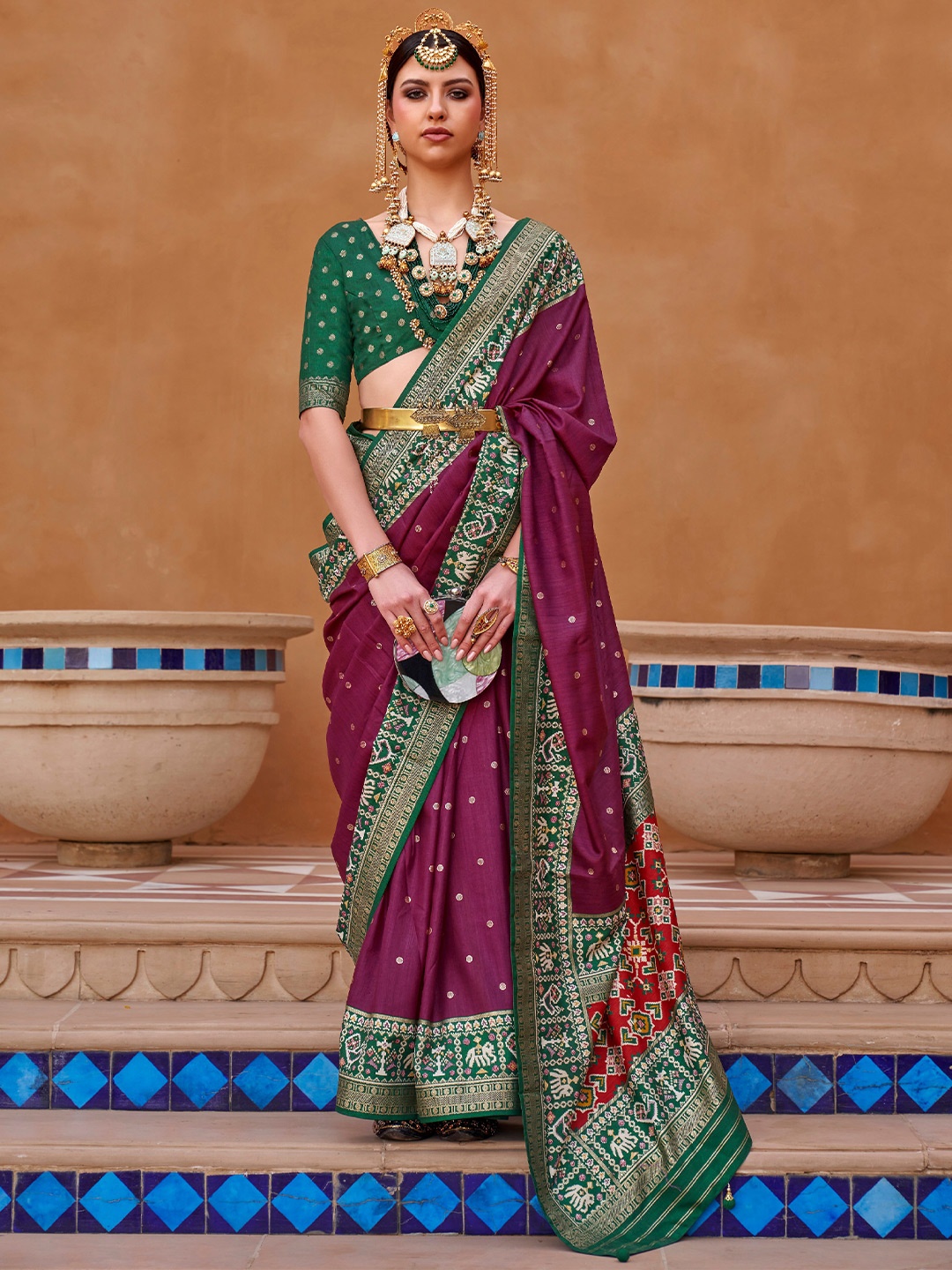 

Mitera Purple & Green Woven Design Zari Silk Blend Saree