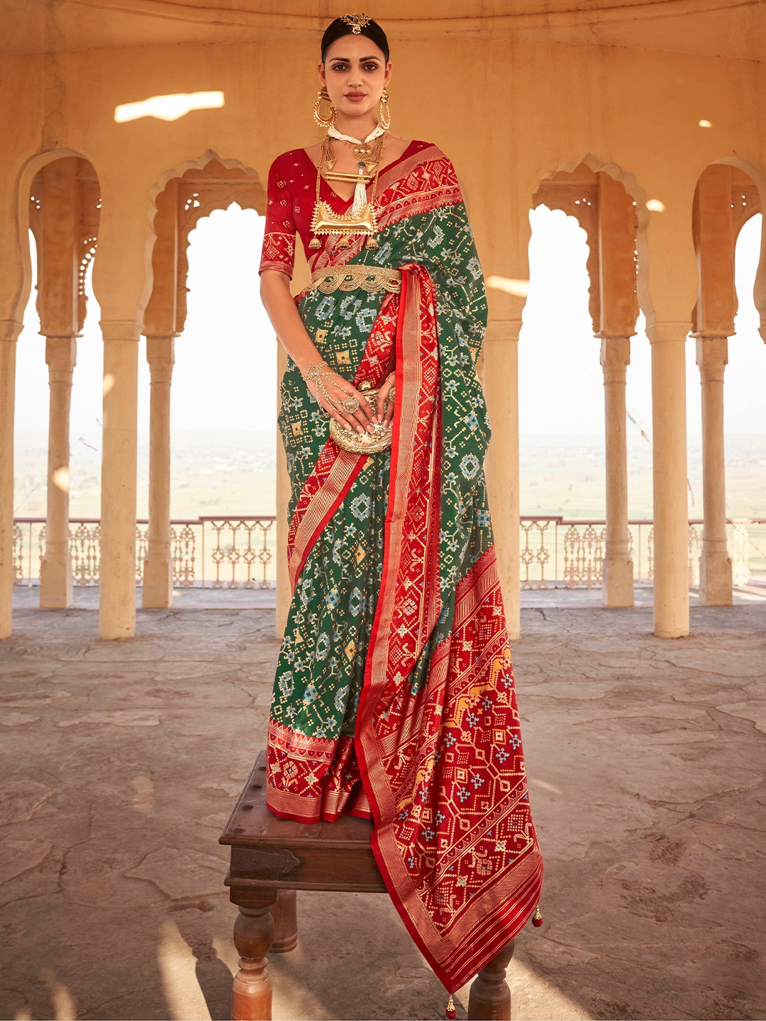 

Mitera Green & Red Ethnic Motifs Woven Design Zari Saree