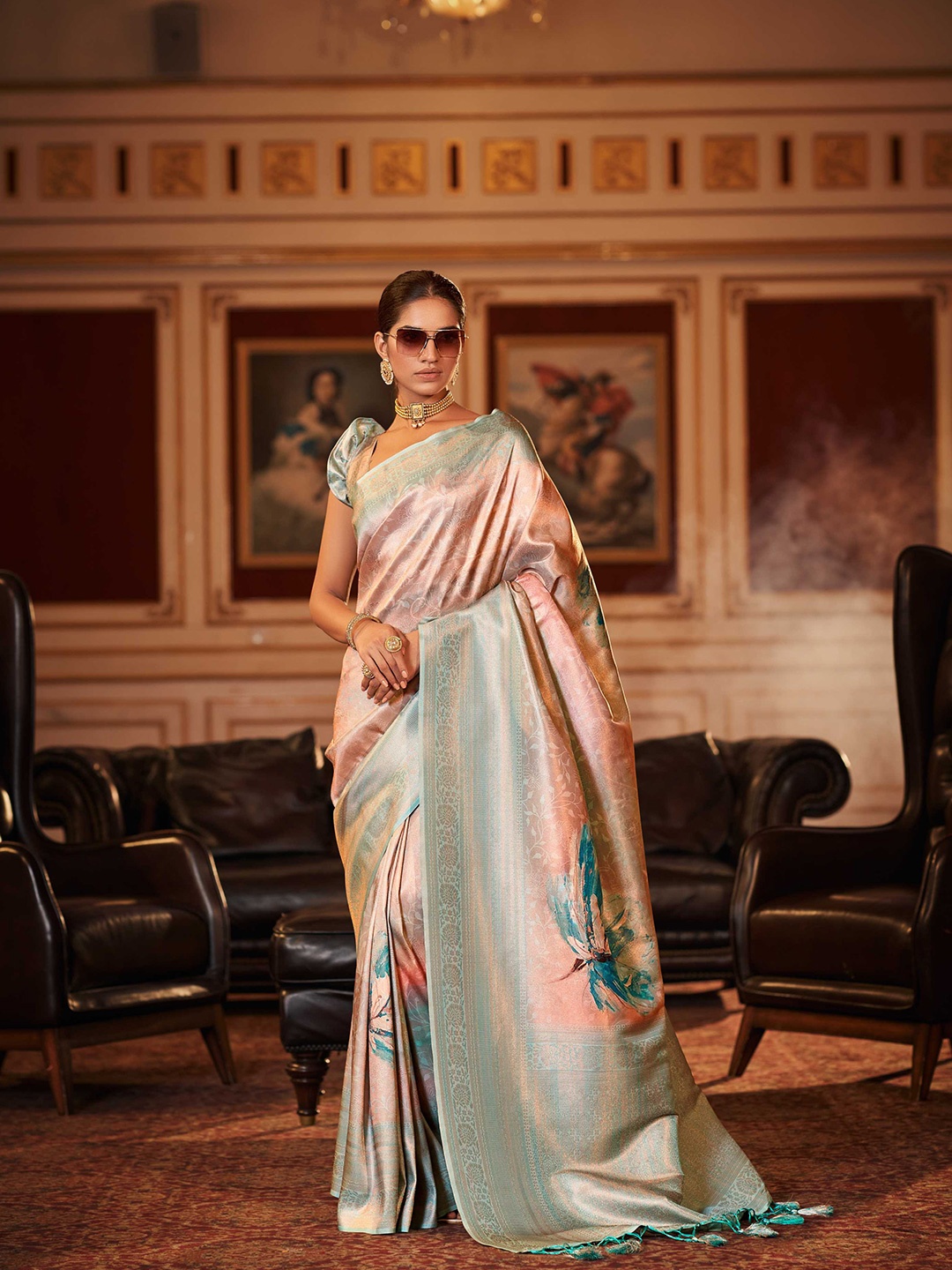 

Mitera Blue & Peach-Coloured Ethnic Motifs Woven Design Zari Saree