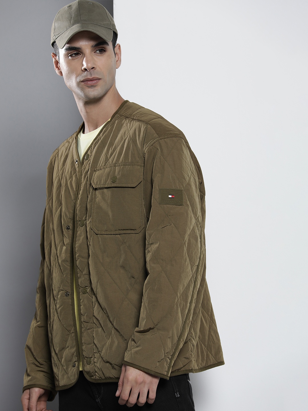 

Tommy Hilfiger Men Solid V-Neck Water Resistant Packable Quilted Jacket, Olive