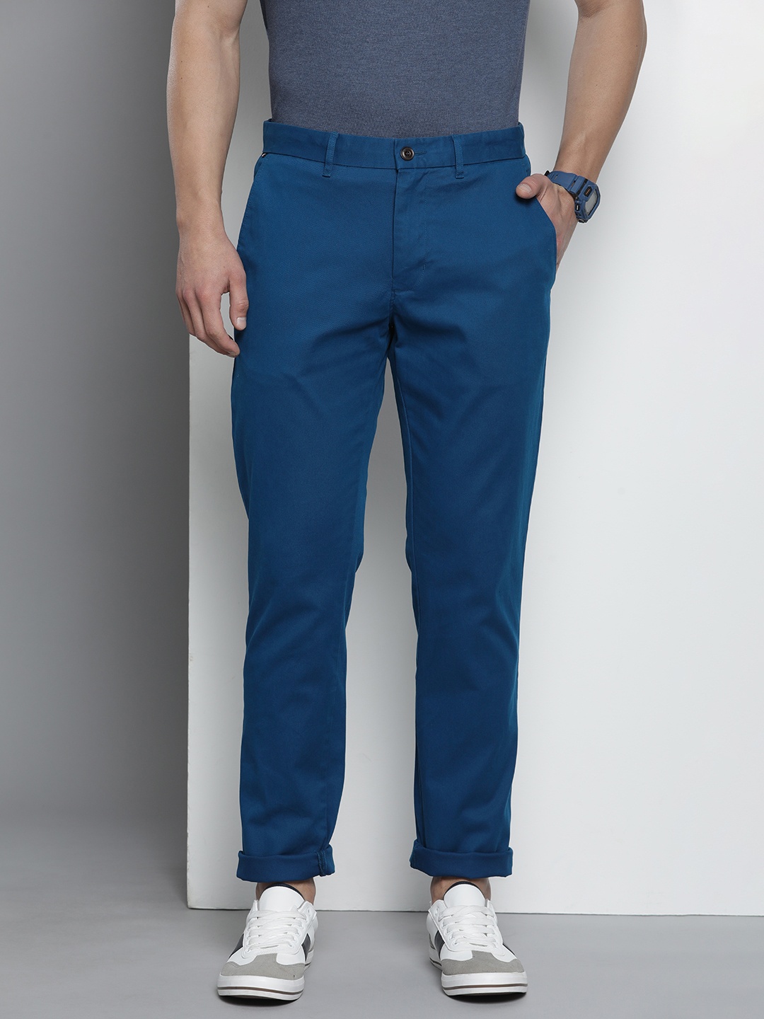 

Tommy Hilfiger Men Solid Regular Fit Chinos Trousers, Blue