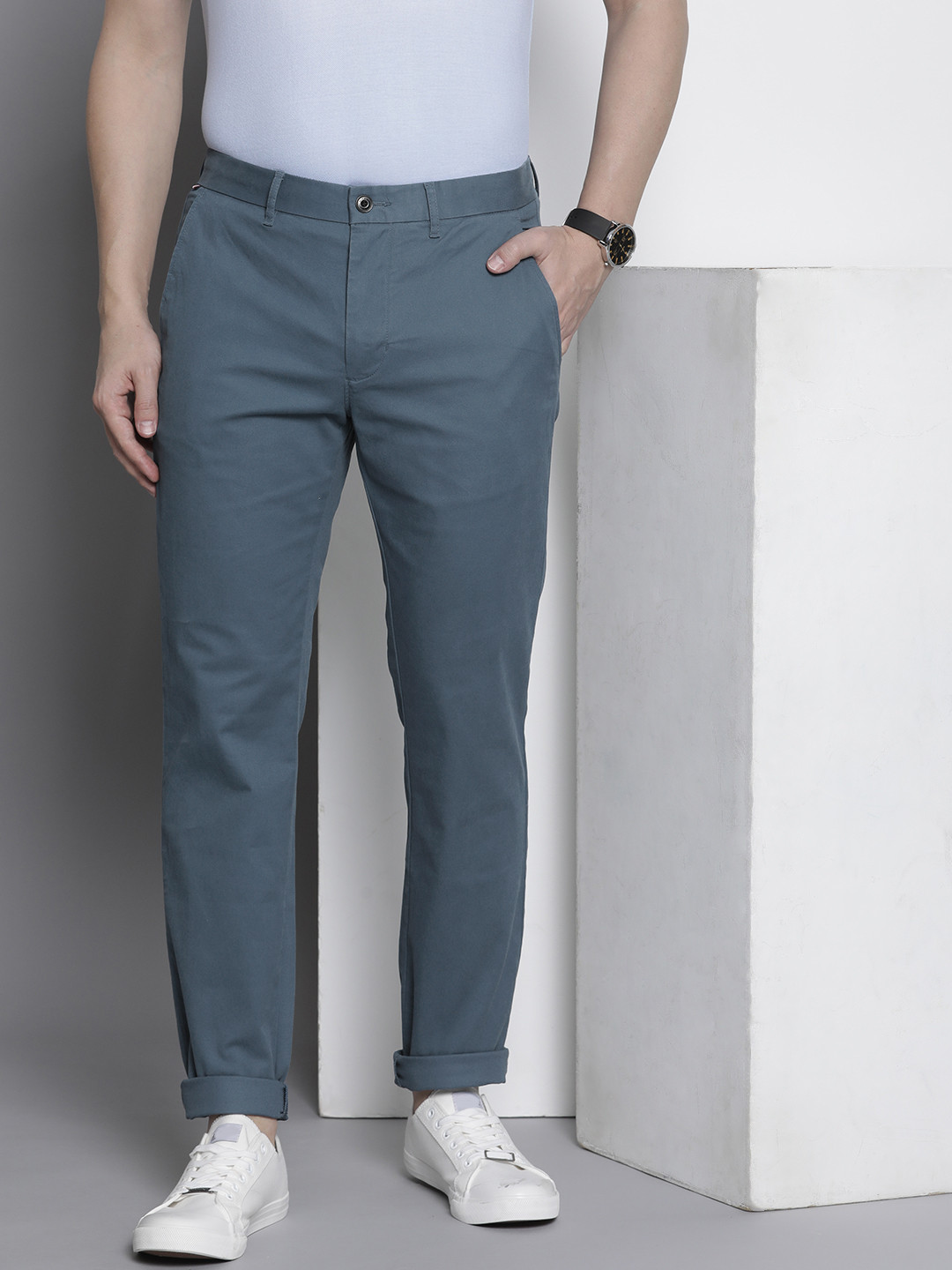 

Tommy Hilfiger Men Solid Mid-Rise Chinos Trousers, Blue