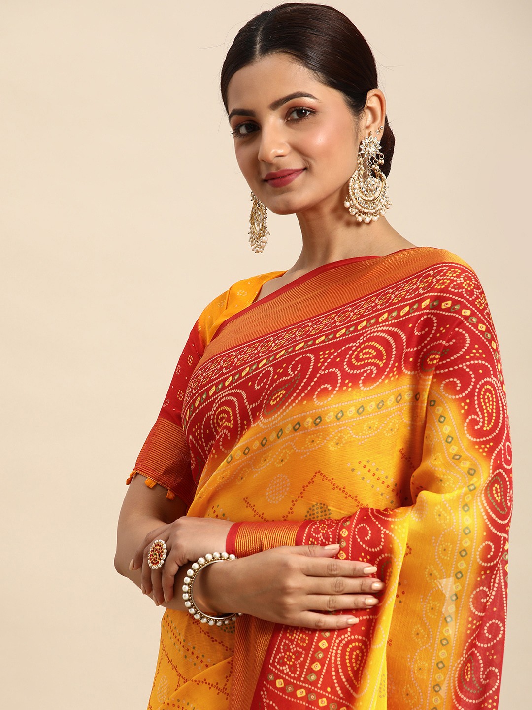 

Mitera Printed Pure Chiffon Bandhani Saree, Yellow