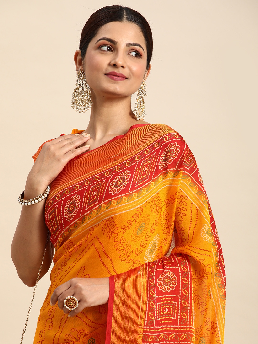 

Mitera Printed Pure Chiffon Bandhani Saree, Yellow