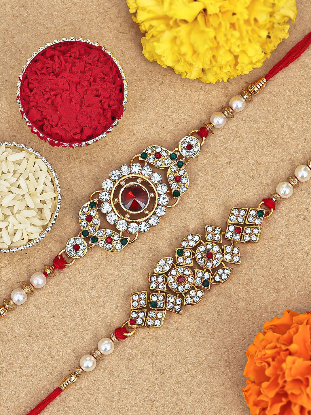 

Sukkhi Rakhi Set Of 2 Gold-Plated Stone-Studded Rakhi Set