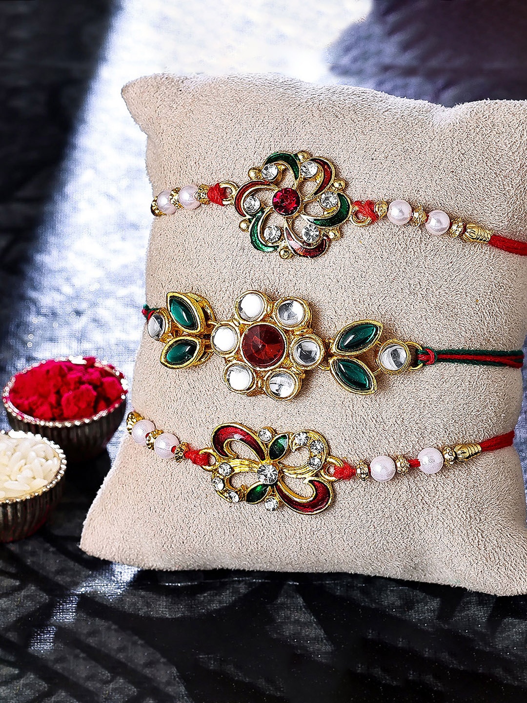 

Sukkhi Rakhi Set of 3 Gold-Plated Rakhi With Roli Chawal & Greeting Card
