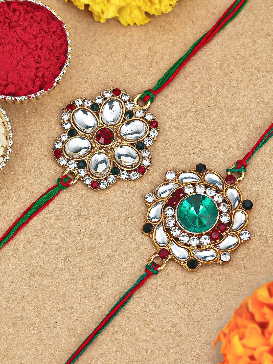 

Sukkhi Rakhi Set Of 2 Gold-Plated Stone-Studded Rakhis With Roli, Rice &GreetingCard