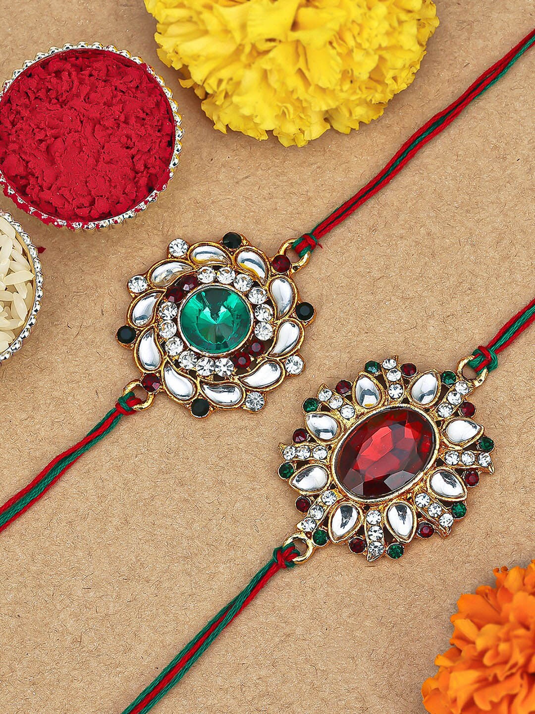 

Sukkhi Rakhi Set Of 2 Gold-Plated Stone-Studded Rakhi Set, Red