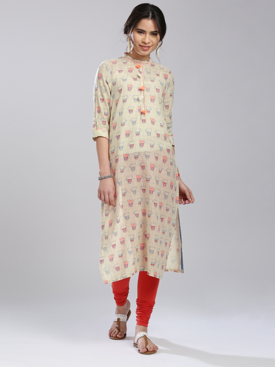 

W Women Cream-Coloured & Coral Orange Quirky Print Straight Kurta