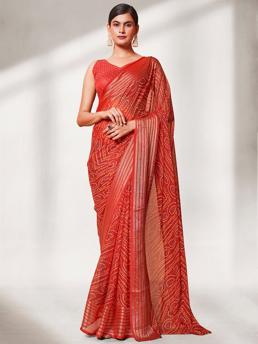 

Kalista Red & Yellow Bandhani Zari Pure Georgette Saree With Blouse Piece
