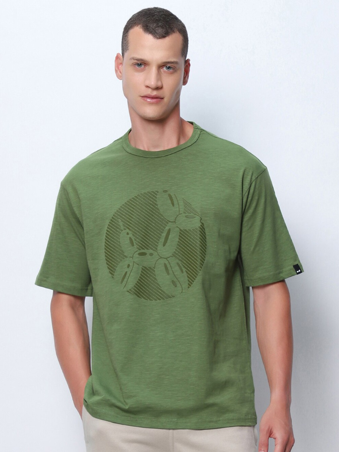 

Bewakoof AIR Air 1.0 Green Air Baloon Graphic Printed Oversized T-shirt