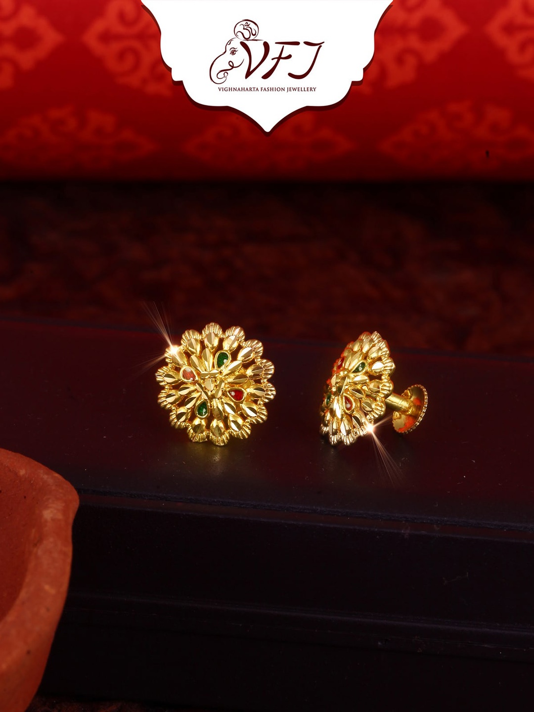 

Vighnaharta Gold-Plated Stone Studded Floral Studs Earrings