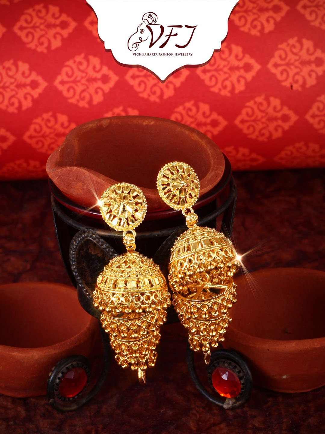 

Vighnaharta Gold-Plated Dome-Shaped Jhumkas Earrings