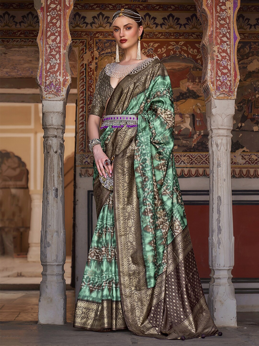 

Anouk Sea Green & Brown Ethnic Motif Woven Design Zari Banarasi Saree