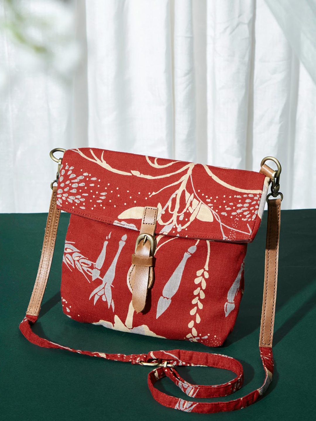 

Fabindia Red Floral Printed Cotton Sling Bag