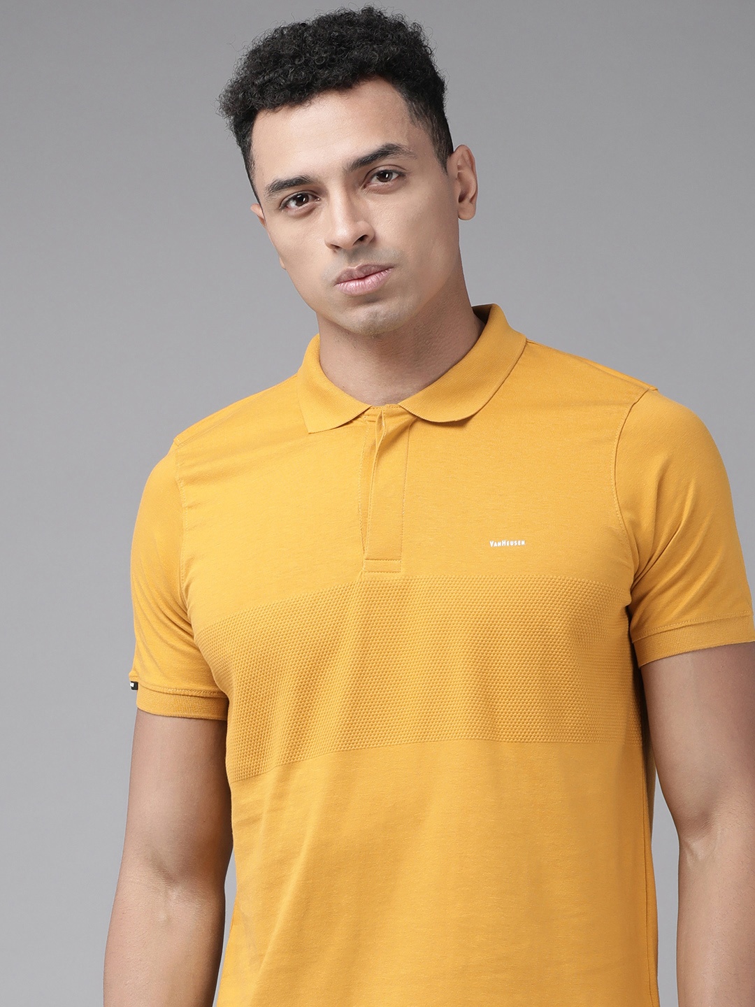 

Van Heusen Solid Polo Collar Pure Cotton T-shirt, Mustard