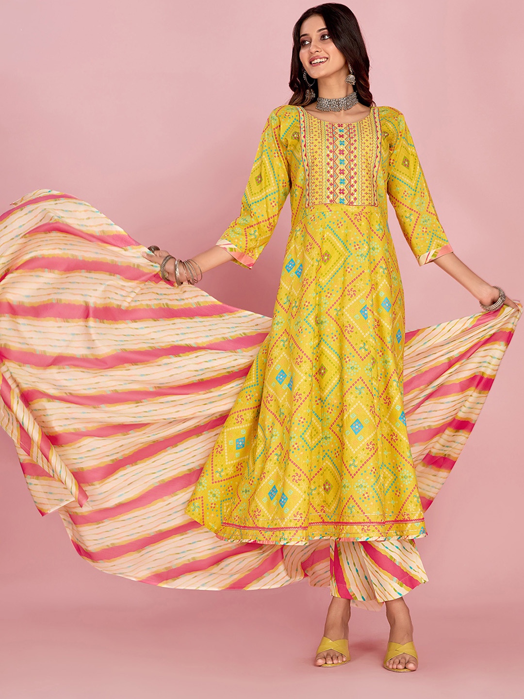 

Sangria Yellow Ethnic Motifs Printed Thread Work A-Line Kurta & Trouser With Dupatta