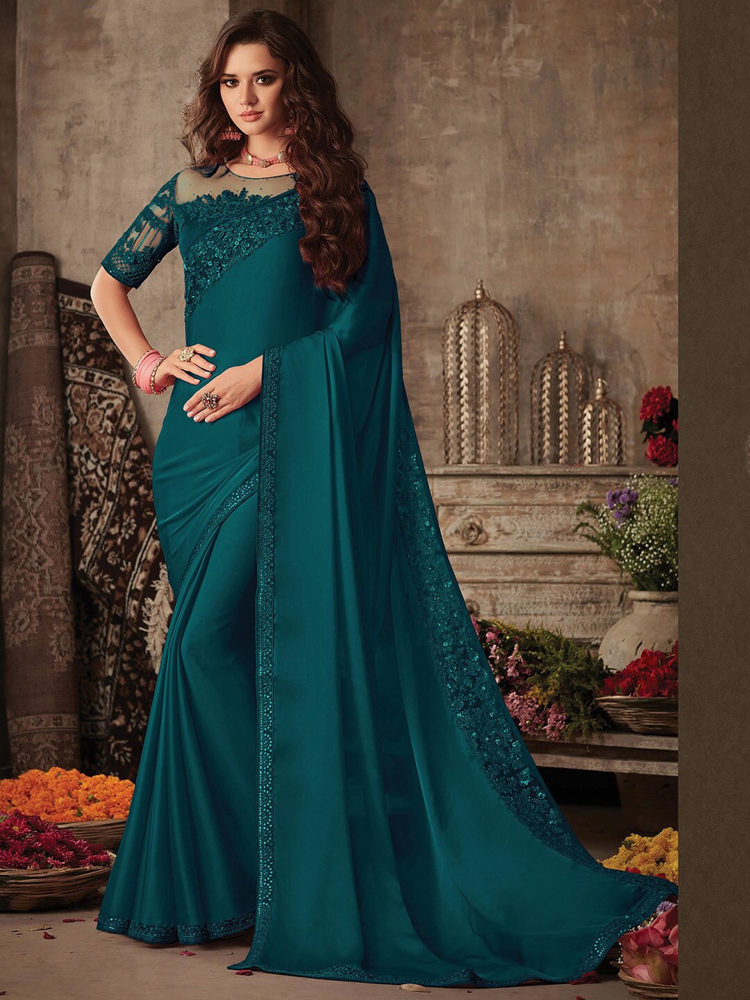 

Mitera Teal Green Embroidered Satin Saree