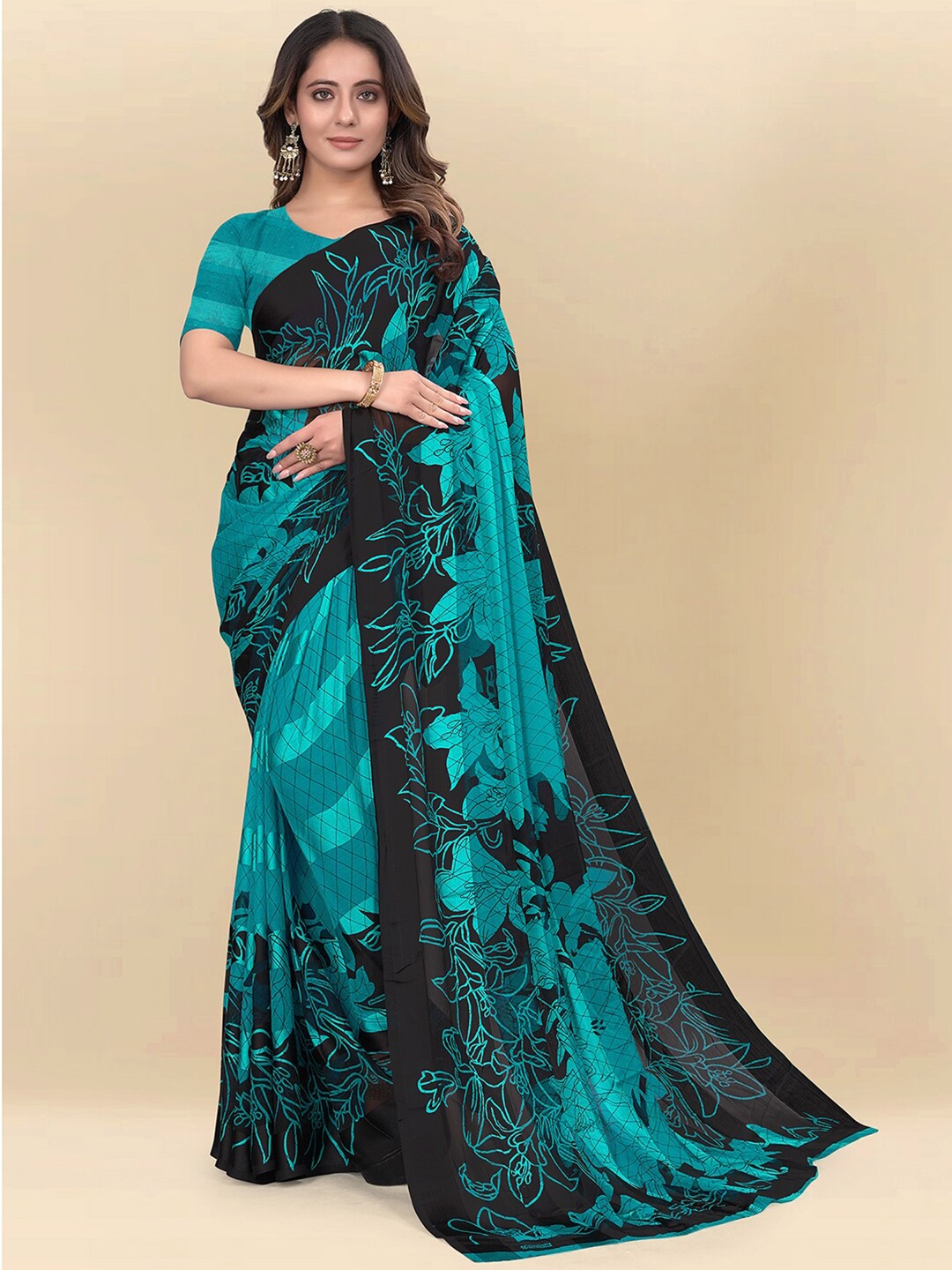 

Mitera Teal & Black Floral Printed Poly Chiffon Saree