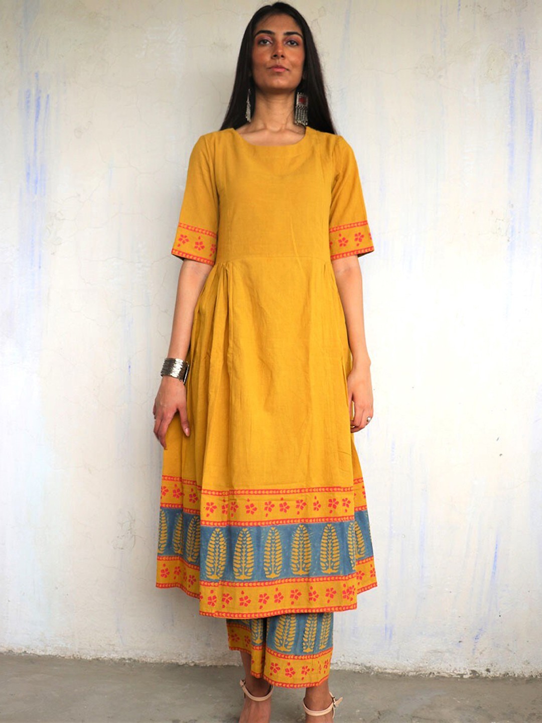 

Chidiyaa Block Printed Pure Cotton Kurta With Palazzos, Yellow