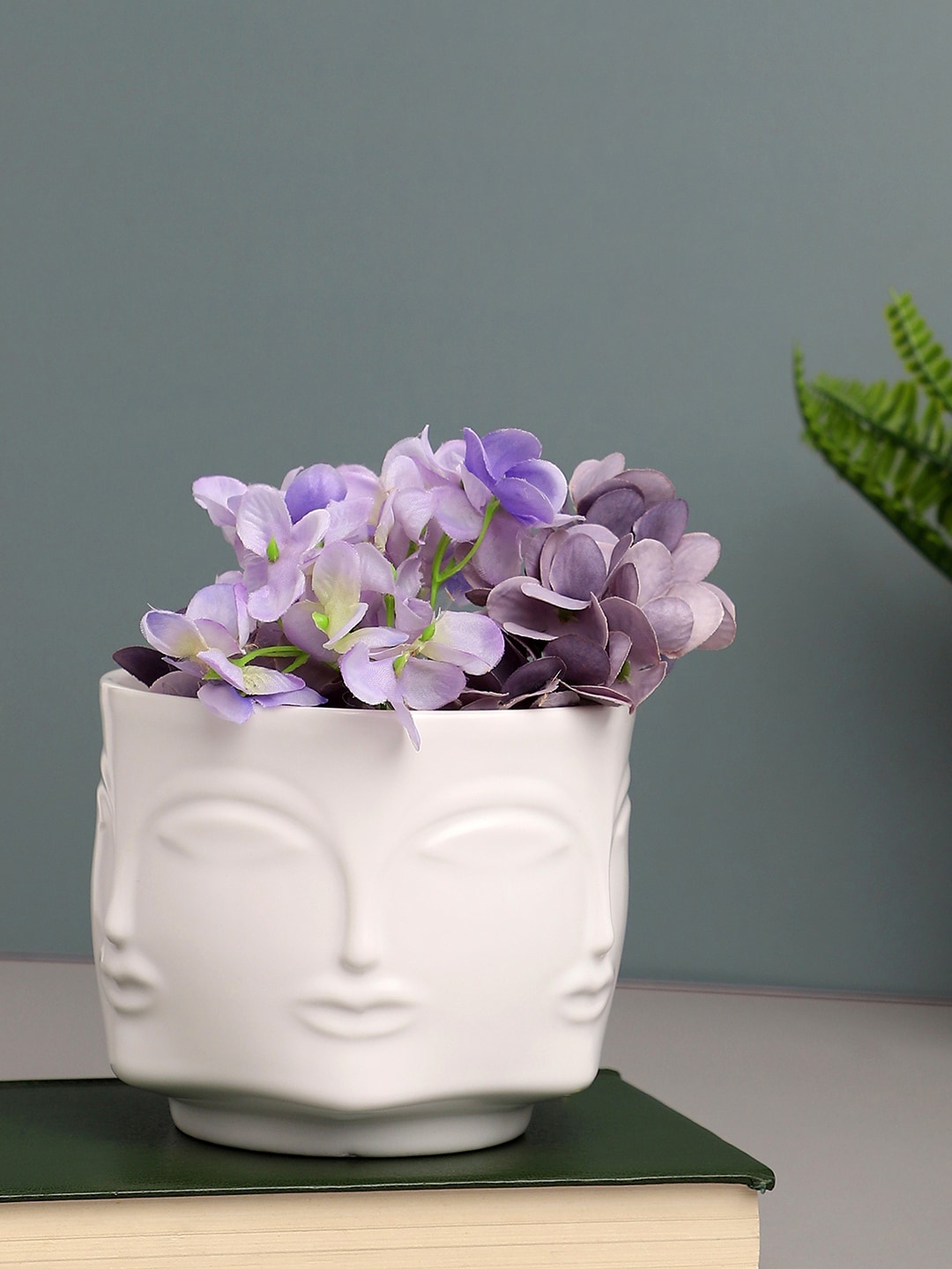 

Bonhomie White Textured Four Faces Vase