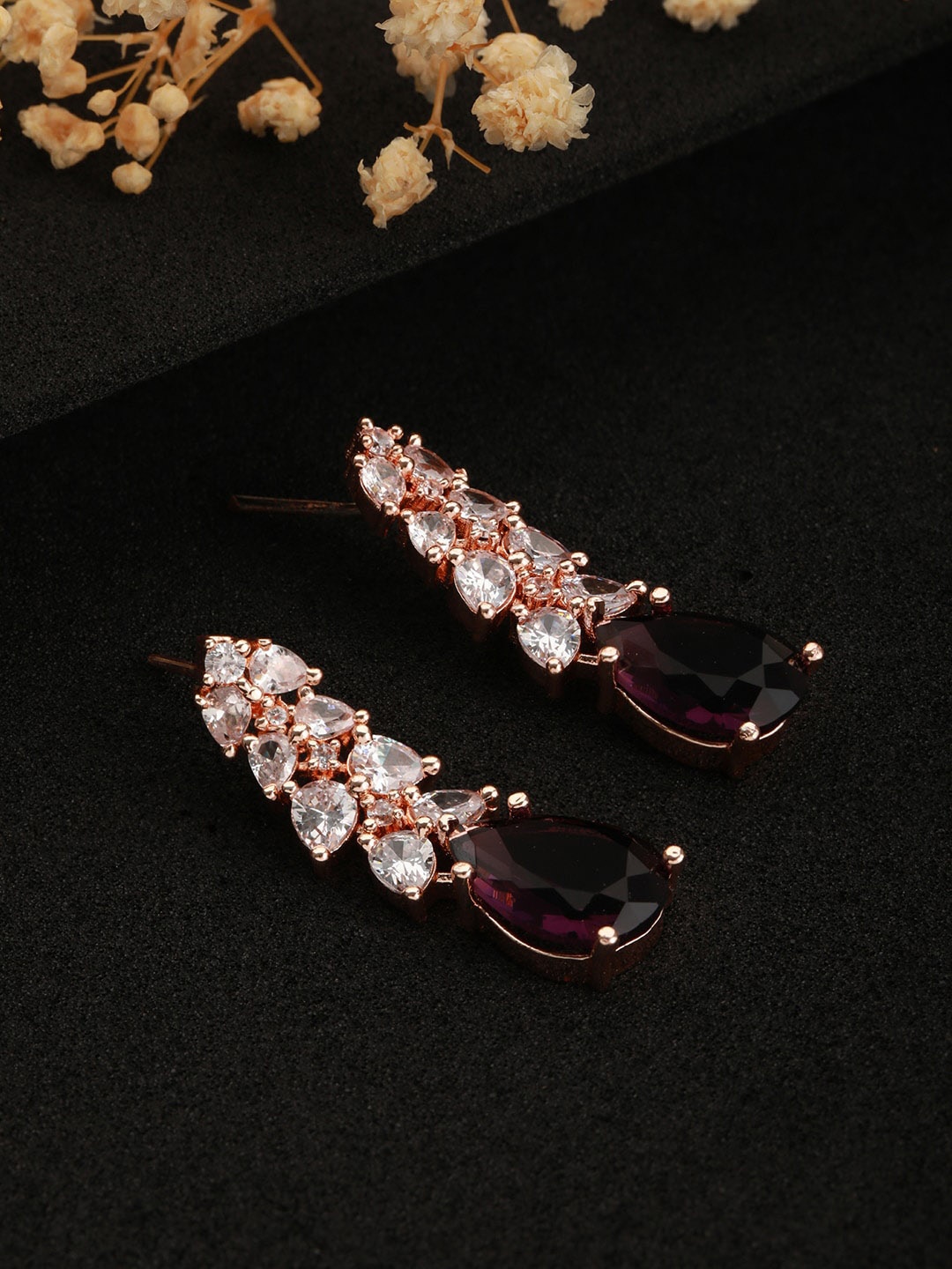 

Jazz and Sizzle Rose Gold Plated Teardrop Shaped AD Studded Drop Earrings