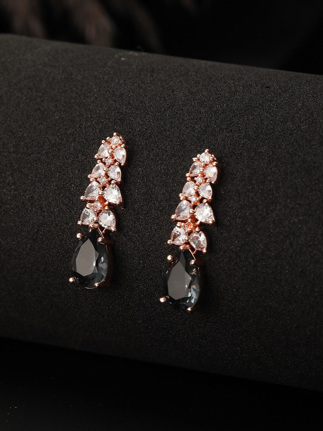 

Jazz and Sizzle Rose Gold Plated Teardrop Shaped AD Studded Drop Earrings