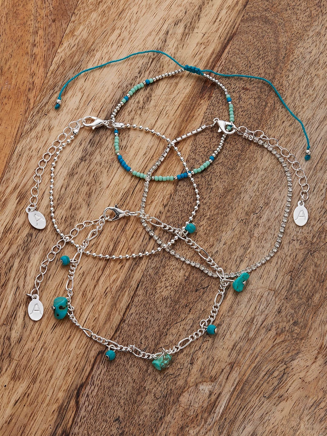 

Accessorize Set Of 4 Silver-Plated Stones-Studded & Beaded Anklets