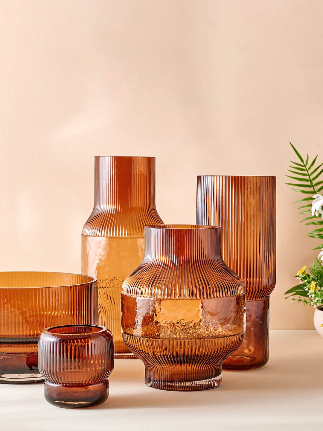 

Home Centre Brown Textured Glass Ribbed Vase