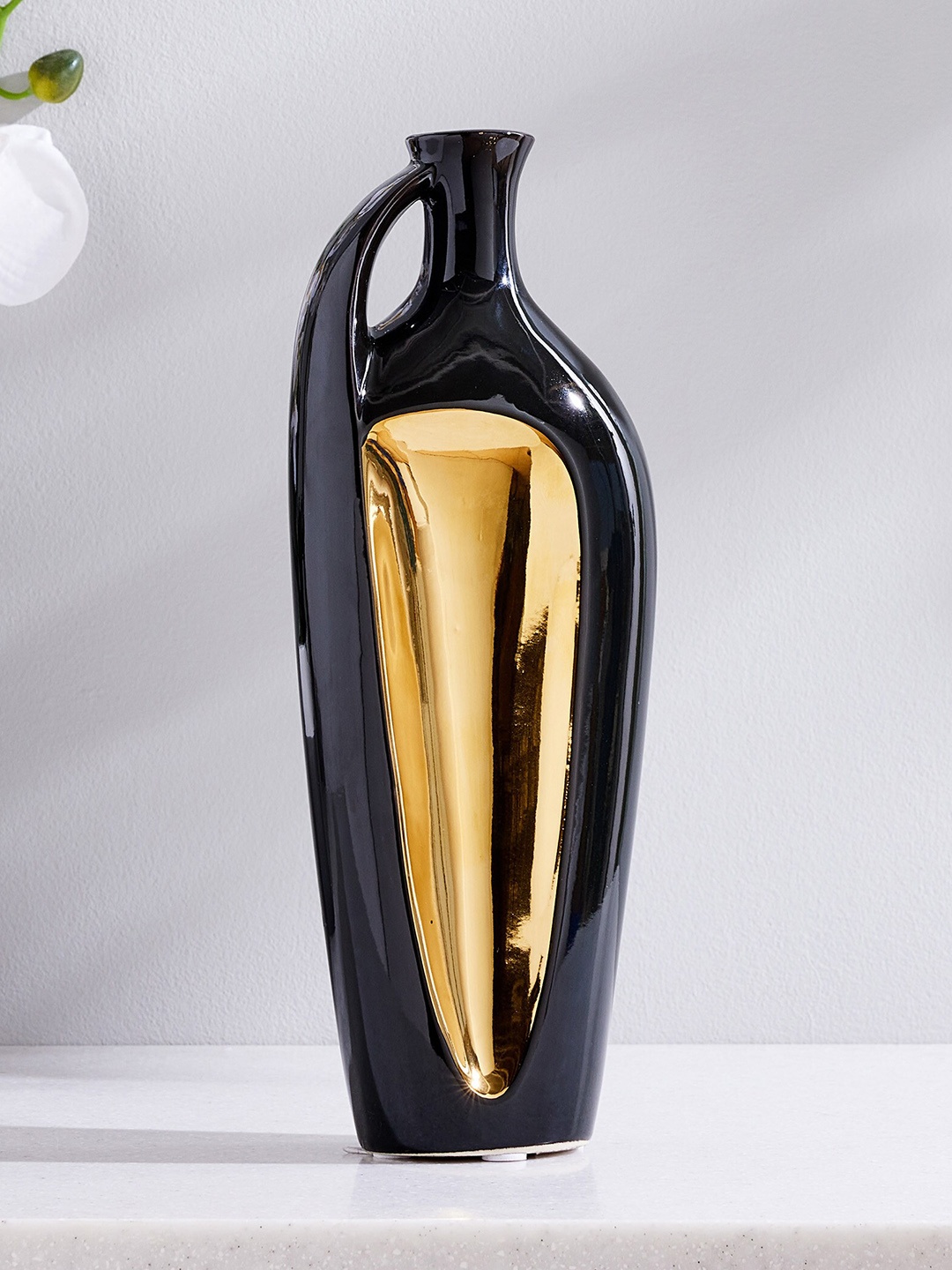 

Home Centre Rivoli Black Ceramic Narrow Tall Vase