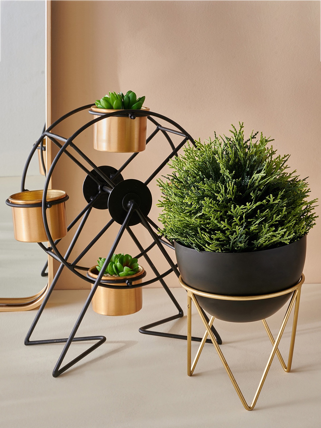 

Home Centre Gloria Black Textured Giant Wheel Planter